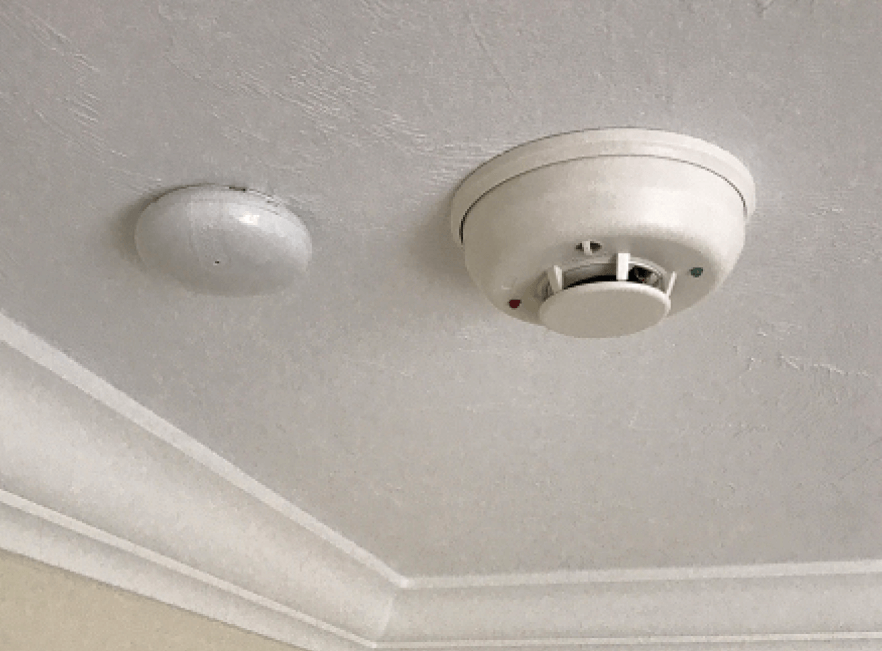 Wireless fire sensor on florida ceiling