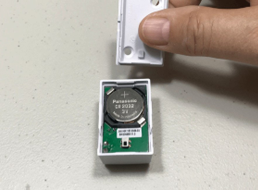 Changing wireless garage tilt sensor battery in Florida
